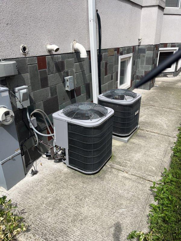 Responded to service call for AC not cooling evenly with safety pan full of water. Upon arrival, assessed outdoor installation with three condenser units positioned on concrete pad. Documented existing HVAC equipment configuration, electrical connections, and associated plumbing infrastructure. Collected equipment information including manufacturer specifications and unit details for new customer account. Provided estimate for complete system replacement based on current equipment condition and performance issues identified during inspection.