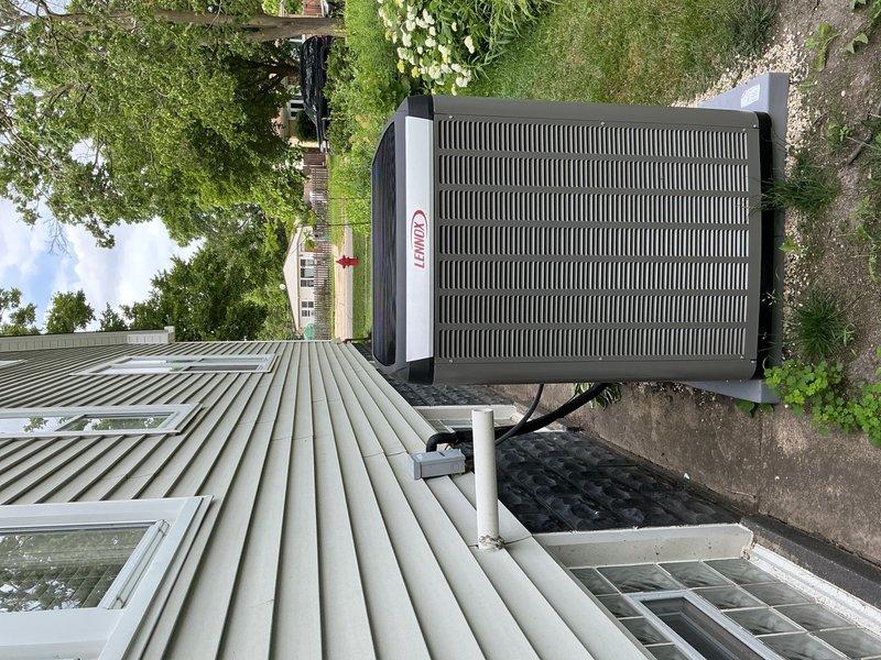 Completed full HVAC system replacement including installation of Lennox SLP99 furnace, Lennox SL25KCV 4-ton air conditioning system, Aprilaire Model 720A whole-home humidifier, and Lennox S40 communicating thermostat with Wi-Fi capability. Reclaimed refrigerant from existing equipment per EPA regulations, disconnected and properly disposed of old furnace, air conditioner condenser, and evaporator coil. Installed new 4-ton condensing unit on exterior concrete pad with new refrigerant lineset and outdoor electrical wiring run to disconnect box. Mounted new evaporator coil in plenum and connected to ductwork with proper sealing. Installed Aprilaire 720A powered humidifier on supply plenum with dedicated water line and humidistat control, capable of humidifying up to 4,200 square feet. Ran new copper refrigerant lines with proper insulation, evacuated system to 500 microns to ensure no moisture or contaminants, and charged system to manufacturer specifications. Installed Lennox S40 touchsc