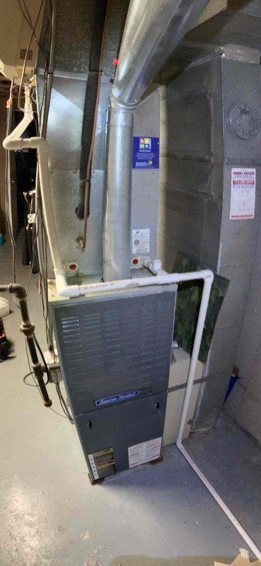 Completed comprehensive clean and check maintenance service on American Standard residential HVAC system per comfort plan agreement. Performed thorough inspection of furnace unit, control boards, electrical connections, and ductwork system; verified all components operating within manufacturer specifications and cleaned accumulated debris from control panel base. Collected comfort plan renewal payment as requested.