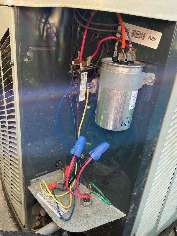 Replaced failed 55/5 dual capacitor on residential R22 air conditioning system. Customer had previously received quote for this repair but deferred service until unit performance necessitated immediate attention. Removed access panel, disconnected electrical connections, and installed new capacitor with proper wire terminations to compressor and condenser fan motor circuits. Verified all electrical connections were secure and tested system operation to confirm proper startup and run cycles.