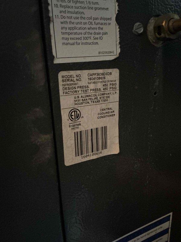 Responded to callback for frozen evaporator coil and no airflow on Goodman system (Model CAPF36366CDB, R410A refrigerant). Previous service had identified low refrigerant charge and added EZ Seal with 410A. Upon callback, system had frozen completely with no air circulation. Provided immediate troubleshooting instructions to power off cooling mode and operate fan only to thaw coil. Discussed system condition and repair versus replacement options, with customer electing to continue repairs to extend equipment life for additional years.