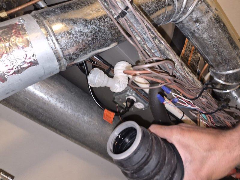 Completed Gold Clean & Check for Cooling maintenance on residential HVAC system. Performed comprehensive inspection of blower wheel assembly, verified proper operation and cleanliness of fan components, and inspected attic-mounted ductwork and condensate drainage system. Noted moderate dust accumulation on ductwork surfaces and confirmed all mechanical components functioning within normal parameters.