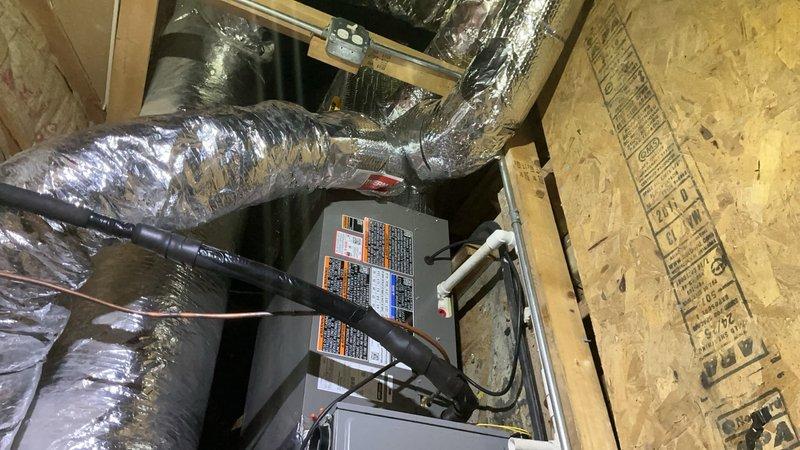 Completed full HVAC system replacement on second floor, removing existing air conditioning condenser and evaporator coil. Reclaimed all refrigerant from old system and disconnected obsolete equipment for proper disposal. Installed new Lennox 2-ton 15 SEER2 single-stage air conditioning condensing unit (Model EL15KC1-024-230) on fresh equipment pad at rooftop location and mounted new matching evaporator coil in attic space. Connected new equipment to existing copper refrigerant line-set, evacuated system to remove moisture and air, and charged with R454B refrigerant to manufacturer specifications. Performed complete system startup, operational testing, and safety inspection to verify proper performance. System now operational with 10-year parts warranty and extended labor coverage.