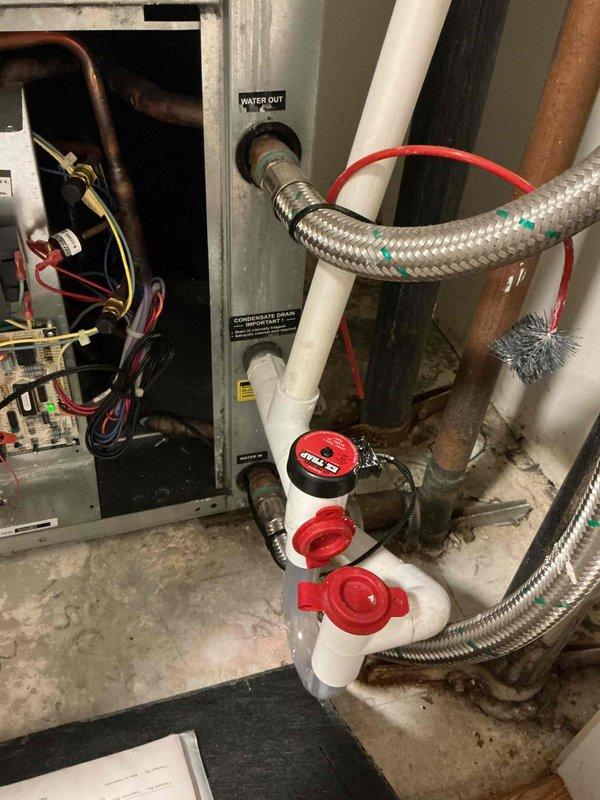 Completed comprehensive clean and check maintenance service on heat pump system and humidifier as part of multi-unit group service. Performed standard inspection procedures including supply air temperature verification at register (89.6°F recorded), examined heat pump control board wiring and electrical connections, and inspected water supply lines, shut-off valves, and plumbing connections associated with the humidification system. All components found operating within normal parameters with no immediate service needs identified.