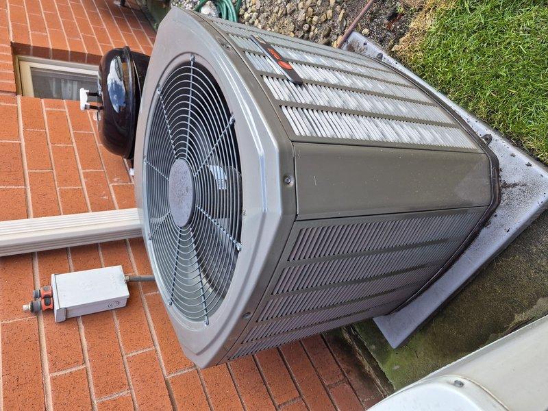 Completed Silver Comfort Plan clean and check on single air conditioning system. Performed comprehensive inspection of outdoor condenser unit, including examination of evaporator coil which showed significant dust and debris accumulation between fins. Documented equipment information and captured condition of copper refrigerant lines, connections, and heat exchanger components. Unit operational upon completion of maintenance service.