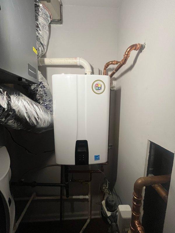 Responded to callback for leaking 2" PVC coupling on tankless water heater condensate drain line. Removed defective coupling section and installed new PVC coupling with proper pitch to ensure drainage. Added additional pipe support to prevent future stress on joints and verified no leaks upon completion.
