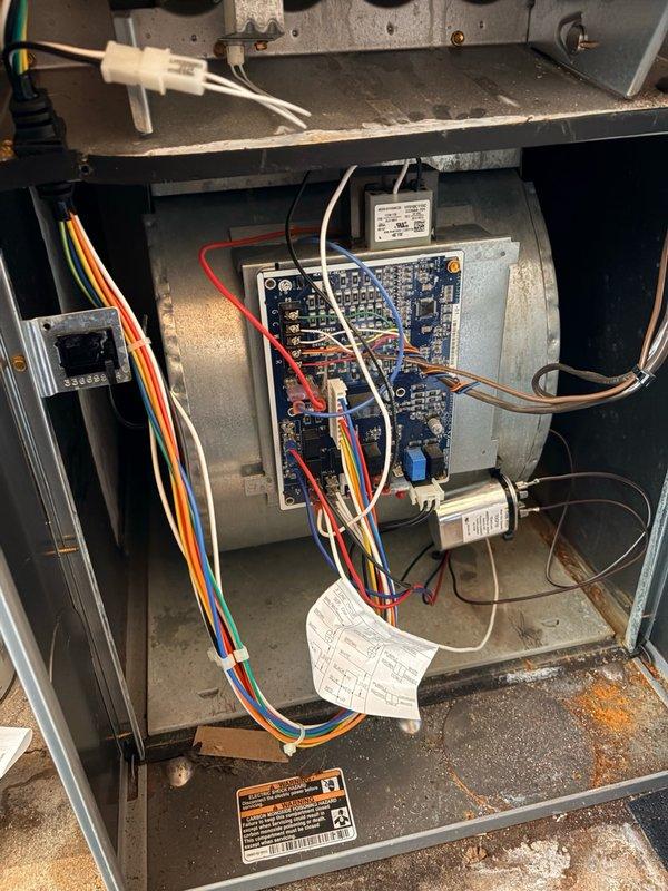Replaced failed blower motor in commercial HVAC unit with universal replacement motor sourced from Johnstone Supply after initial incorrect part was provided. Removed existing blower assembly, installed compatible universal motor for ICP system, reconnected all electrical connections, and verified proper operation of control board and system components.