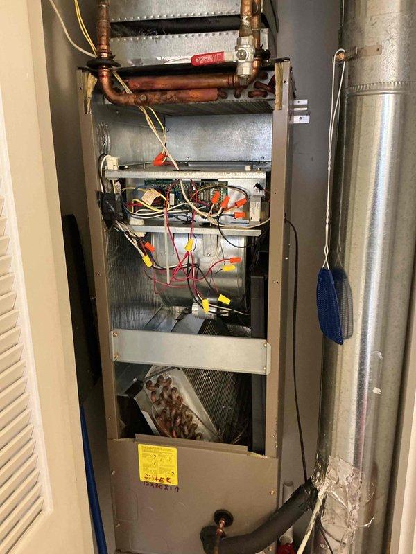 Responded to Saturday evening no-cooling call. Upon arrival, performed diagnostic inspection of split system HVAC unit. Inspected furnace cabinet interior components including gas valve connections, electrical wiring harness, and heat exchanger assembly. Examined copper refrigerant lines for signs of leakage or damage, noting oxidation present on piping. Completed visual assessment of all accessible system components and connections. Collected standard dispatch fee and discussed available repair options with property owner, including new customer discount eligibility and preventative maintenance plan enrollment.
