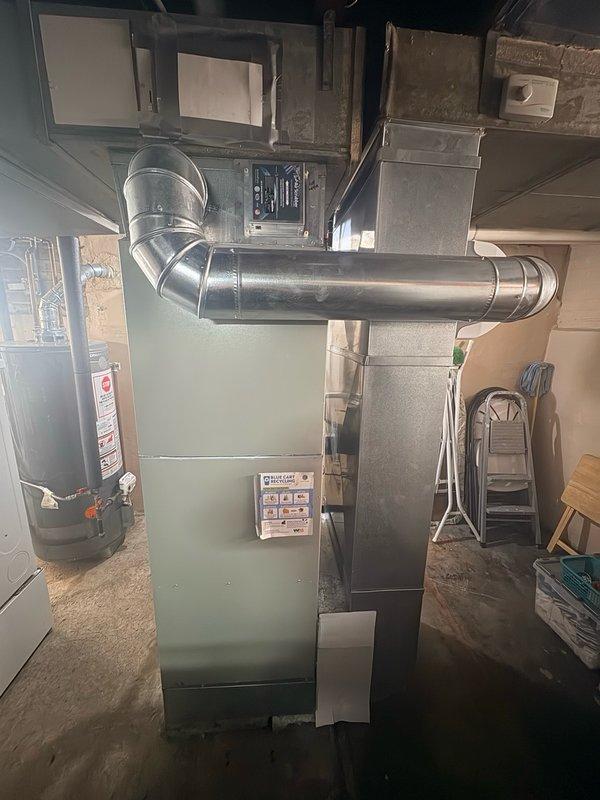 Completed Comfort Plan clean and check on single HVAC system in residential basement mechanical room. Performed comprehensive maintenance inspection on furnace unit, verified all safety controls and operational parameters, and cleaned components as needed. Inspected and serviced air scrubber unit, replaced UV bulb to restore proper air purification functionality. Checked ductwork connections, airflow, and system cycling. All equipment tested and operating within manufacturer specifications upon completion.