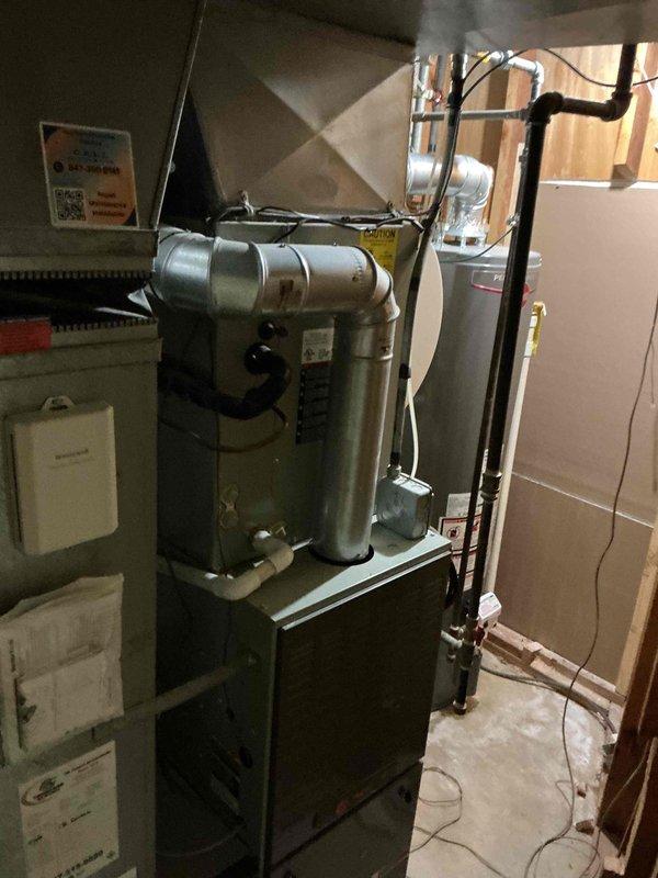 Completed comprehensive tune-up service on single HVAC system including electric air handler and furnace unit. Removed existing electronic air cleaner and installed standard filter box with 20x25x5 filter media for improved maintenance accessibility. Performed standard maintenance procedures, inspected electrical connections and control wiring, verified proper operation of all system components, and documented equipment condition with photographs.