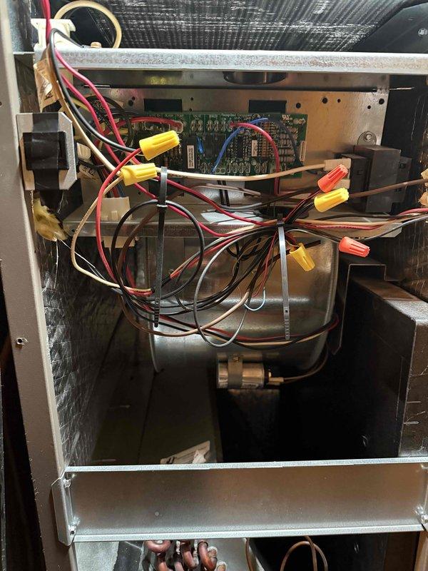 Completed Comfort Plan Clean and Check maintenance service on air conditioning and air handler system. Performed comprehensive inspection of internal components including control board, electrical connections, blower motor assembly, and cabinet interior, verifying all wiring connections and mechanical components are operating within normal parameters.