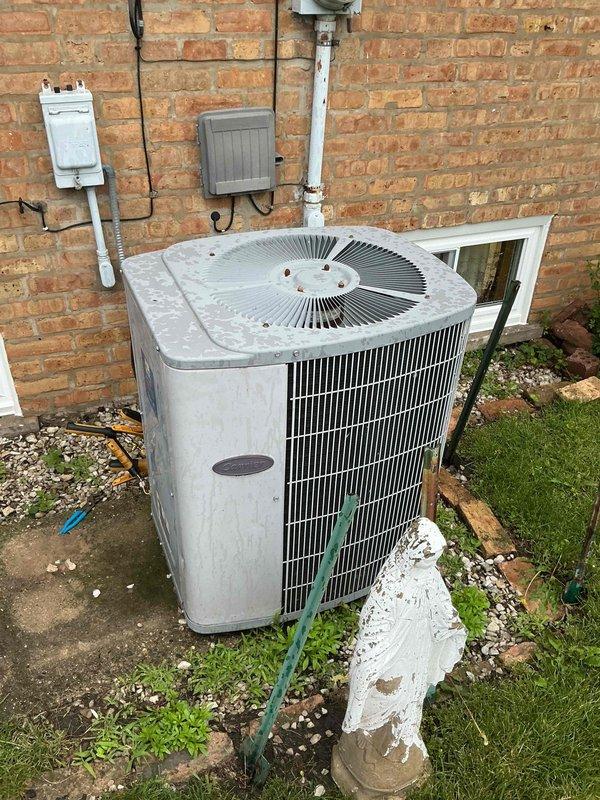 Completed spring preventive maintenance on residential split system air conditioning unit per comfort plan agreement. Performed comprehensive clean and check procedures on Carrier HVAC system, including outdoor condenser unit and indoor air handler/furnace assembly. Inspected electrical connections, disconnect box, and conduit at exterior unit; verified proper airflow through condenser coil fins; checked refrigerant lines and condensate drainage. Evaluated indoor equipment installation, ductwork connections, and system accessibility in basement location. All components operating within normal parameters; system ready for cooling season.