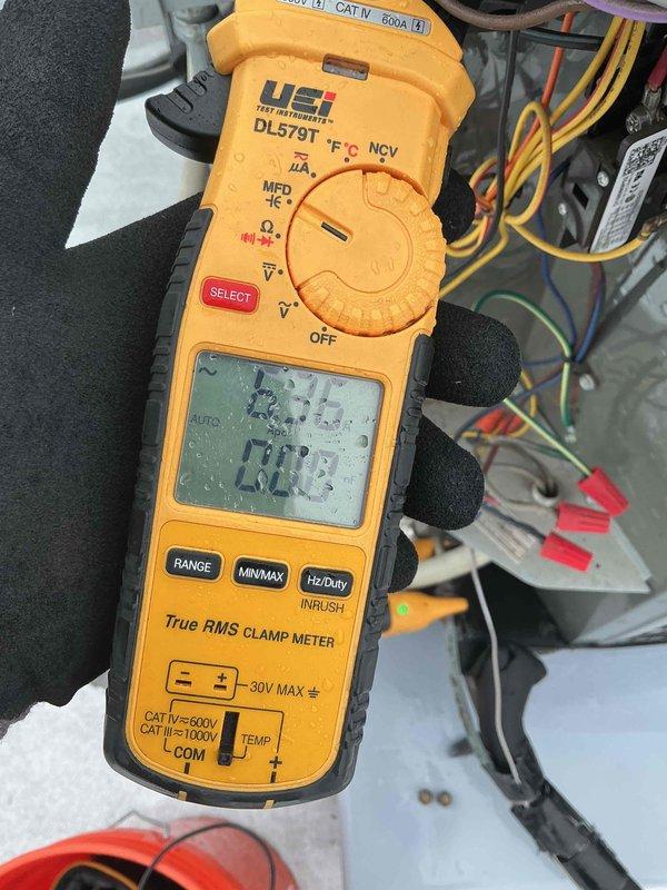 Completed spring preventive maintenance on two commercial air conditioning condensing units per customer care plan. Performed comprehensive cleaning and system checks, including electrical diagnostics with clamp meter showing 132.8-amp reading, inspected control boards and wiring connections, and verified proper operation of all components.