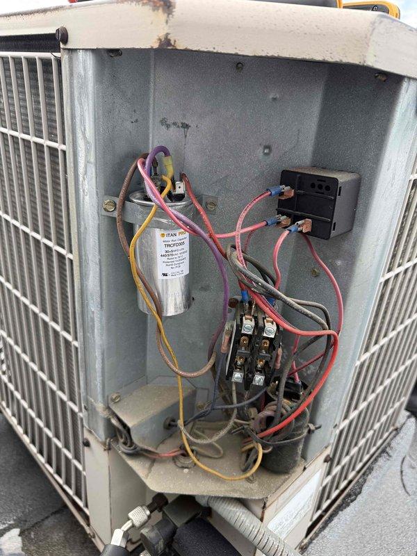 Responded to no cooling call on 10+ year old system utilizing R-22 refrigerant. Upon arrival, found evaporator coil heavily frosted, indicating low refrigerant charge. Customer provided personal supply of R-22 refrigerant as previously discussed during last service visit. Added refrigerant to system using customer-supplied tank with appropriate adapter for older refrigerant container. Verified proper charge levels, system operation restored, and unit cooling effectively upon departure.