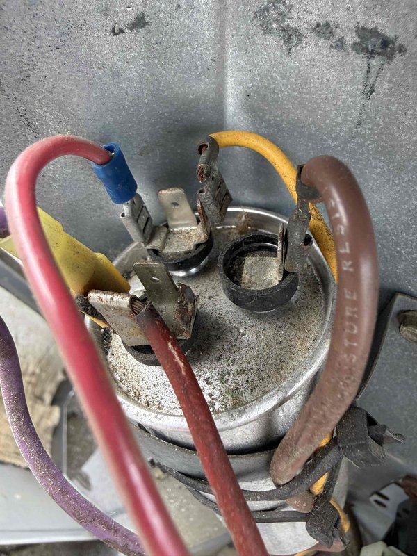 Responded to no cooling call on 10+ year old system utilizing R-22 refrigerant. Upon arrival, found evaporator coil heavily frosted, indicating low refrigerant charge. Customer provided personal supply of R-22 refrigerant as previously discussed during last service visit. Added refrigerant to system using customer-supplied tank with appropriate adapter for older refrigerant container. Verified proper charge levels, system operation restored, and unit cooling effectively upon departure.