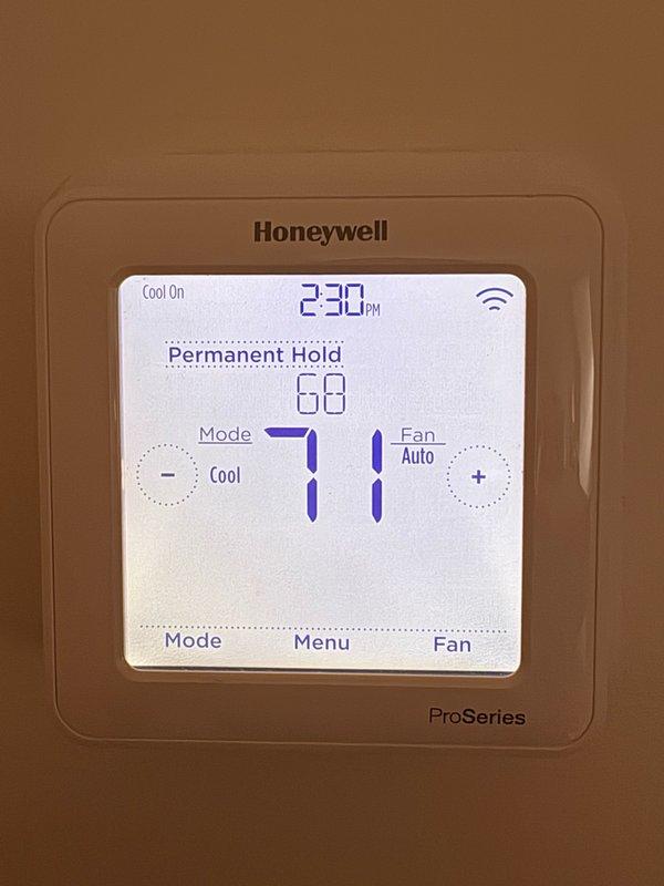 Completed replacement of piston in evaporator coil for residential HVAC system. System was verified operational with thermostat set to cooling mode at 68°F with permanent hold setting, confirming proper airflow and refrigerant metering through the new piston component.