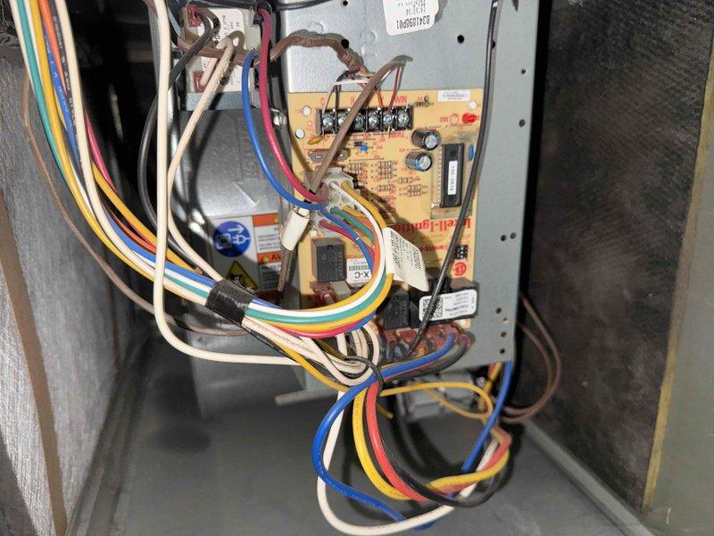 Completed scheduled air conditioning clean and check maintenance per comfort plan agreement. Performed comprehensive system inspection including electrical testing of control board components, capacitors, and relay circuits. Verified proper voltage and amperage readings using clamp meter, confirming system operating within manufacturer specifications at 444 reading. Inspected all electrical connections, wiring bundles, and control components for signs of wear or deterioration. System found to be operating efficiently with all components functioning properly.