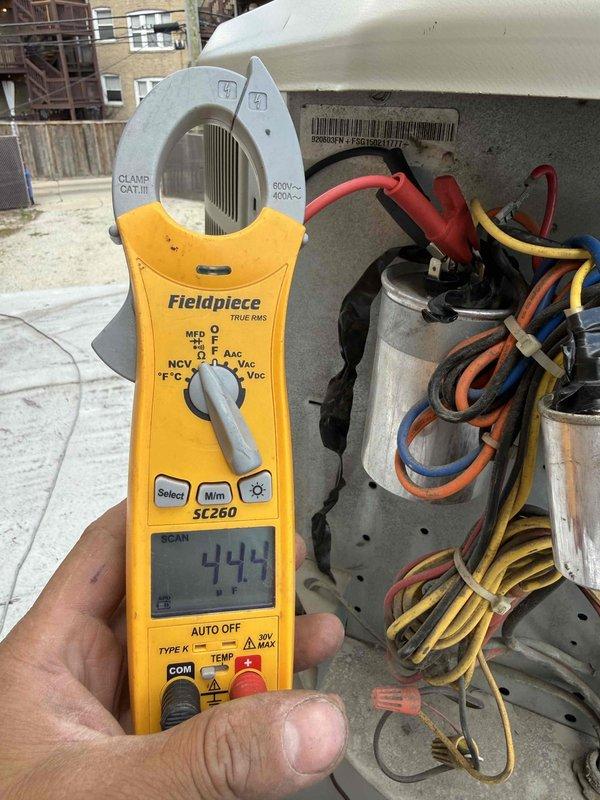 Completed scheduled air conditioning clean and check maintenance per comfort plan agreement. Performed comprehensive system inspection including electrical testing of control board components, capacitors, and relay circuits. Verified proper voltage and amperage readings using clamp meter, confirming system operating within manufacturer specifications at 444 reading. Inspected all electrical connections, wiring bundles, and control components for signs of wear or deterioration. System found to be operating efficiently with all components functioning properly.