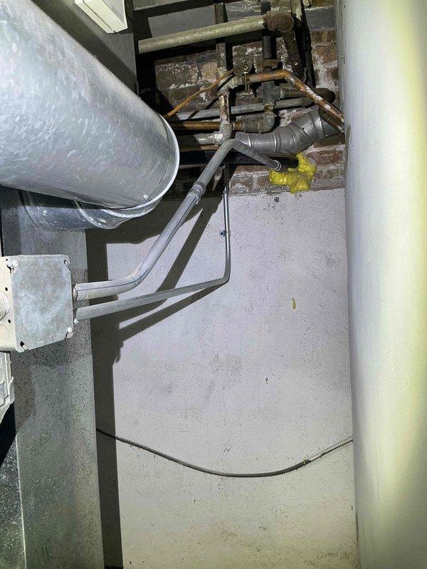 Completed humidifier repair service in basement utility area. Inspected and serviced humidification system connected to existing HVAC infrastructure, addressing operational issues to restore proper function. System tested and confirmed operational upon completion.