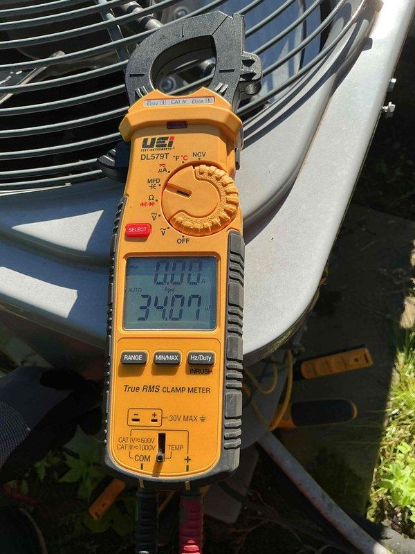 Completed comprehensive clean and check maintenance service on two air conditioning systems per service contract plan. Performed standard inspection procedures including electrical measurements, verified capacitor specifications at 35/5 MFD, and documented system operating parameters with all readings within normal range. Both units tested and operating properly upon completion.