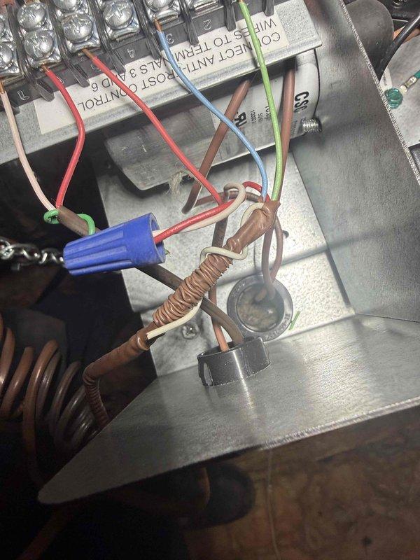 Responded to callback for non-functional C wire installation at downstairs thermostat location. Inspected HVAC control wiring and connections at air handler, verifying proper wire routing and terminations. Tested and confirmed C wire continuity, corrected wiring connections, and verified proper thermostat power supply to resolve installation issue.