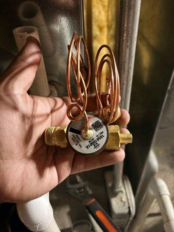 Performed comprehensive leak search on HVAC system to diagnose refrigerant loss and determine source before proceeding with component replacement. Upon thorough inspection of the evaporator coil and surrounding refrigerant circuit, successfully identified the thermal expansion valve (TXV) as the primary issue rather than coil leakage. Replaced faulty TXV with new component, restoring proper refrigerant metering and system operation.