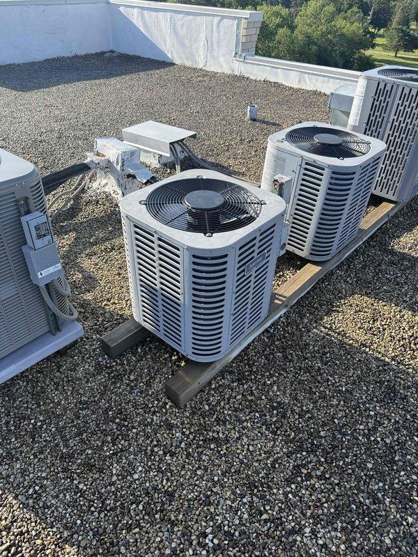 Replaced defective fan motor on rooftop Ameristar HVAC unit under manufacturer warranty. Accessed internal compartment, disconnected electrical connections and capacitor wiring, removed failed motor assembly, and installed new OEM replacement motor. Verified proper electrical connections, tested unit operation, and confirmed adequate airflow and system functionality upon completion.