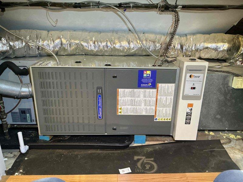 Completed comprehensive Comfort Plan clean and check maintenance service on single-zone residential air conditioning system. Performed thorough inspection of outdoor condensing unit, including examination of control board, electrical connections, and all major components. Inspected indoor air handler unit located in attic space, verifying proper operation of blower assembly, ductwork connections, and drain line functionality. All system components found operating within manufacturer specifications with no deficiencies noted. Documentation captured for service records.