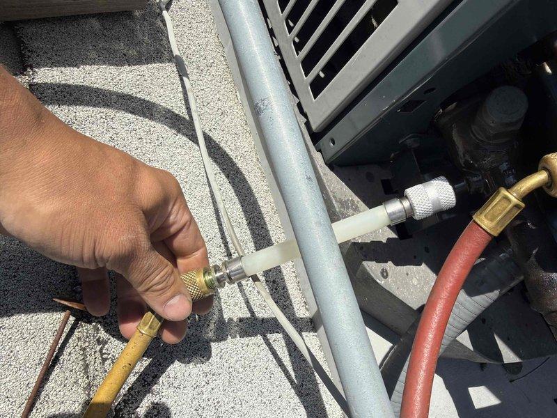 Responded to service call for two residential air conditioning systems experiencing low refrigerant levels. Added approximately 4 pounds of R-410A refrigerant to the Nordyne unit and 6 pounds to the American Standard unit to restore proper operating pressures. Applied EZ Seal leak detection additive to both systems to help identify leak locations and potentially slow refrigerant loss. Verified system operation and checked air filters per request. Advised that refrigerant charge carries no warranty due to active leak condition and system pressures may decline over time until leak repair is completed.