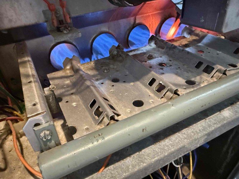 Replaced defective gas valve on residential gas furnace. Removed old valve assembly, installed new gas valve, and reconnected gas supply line. Verified proper burner ignition sequence and confirmed all four burners were operating with proper blue flame characteristics. Tested system operation through complete heating cycle to ensure reliable performance and safe combustion. All connections leak-tested and system restored to normal operation.