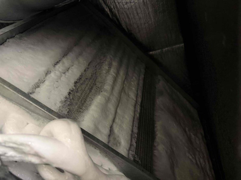 Responded to no cooling complaint on system less than 5 years old with indoor temperature reading 76°F despite thermostat set to 71°F. Upon inspection, discovered evaporator coil heavily restricted with dust, dirt, and debris accumulation, significantly impeding airflow and heat transfer capacity. Cleaned evaporator coil assembly, removing accumulated particulate matter from fins and surfaces to restore proper system operation and cooling efficiency.