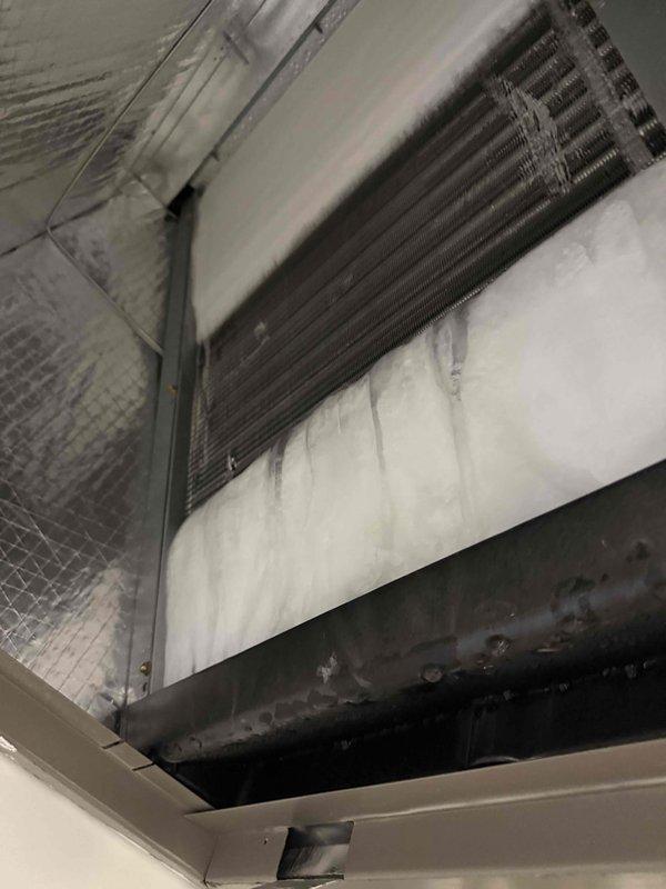 Responded to no cooling complaint on system less than 5 years old with indoor temperature reading 76°F despite thermostat set to 71°F. Upon inspection, discovered evaporator coil heavily restricted with dust, dirt, and debris accumulation, significantly impeding airflow and heat transfer capacity. Cleaned evaporator coil assembly, removing accumulated particulate matter from fins and surfaces to restore proper system operation and cooling efficiency.
