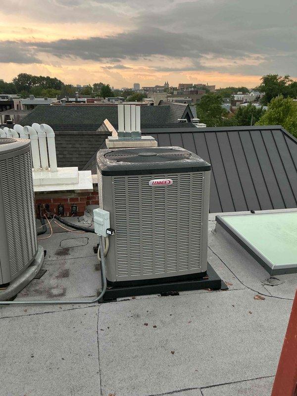 Completed full HVAC system replacement on first floor, including reclamation of existing refrigerant from old condenser, coil, and copper line-set prior to disconnection and disposal. Installed new Lennox 5-ton 22 SEER2 air conditioning condensing unit (Model EL22KCV-060-230) on rooftop location with new pad and vibration isolation pads, along with new evaporator coil connected to existing copper refrigerant lines. System was evacuated to remove moisture and air, then charged with R454B refrigerant per manufacturer specifications. Installed Refrigerant Detection System (RDS) for safety compliance. Crane services were utilized for removal of old equipment from roof and installation of new condensing unit. Upon completion, performed full system start-up, operational testing, adjustment of all components, and comprehensive safety inspection to ensure proper function. Unit is now operating within normal parameters with 10-year parts warranty and 10-year extended labor agreement in effect.