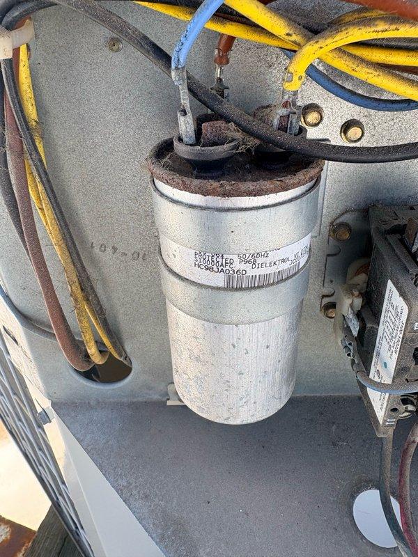 Completed commercial HVAC maintenance agreement service on two rooftop air conditioning units located in warehouse facility. Performed comprehensive preventive maintenance per contract protocol including filter replacement with one 20x20x1 and one 16x20x1 filter, system inspection, and equipment data collection. Documented deteriorated capacitor showing significant corrosion and terminal degradation requiring future replacement recommendation.
