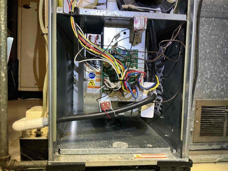 Completed comprehensive spring clean and check on single air conditioning system per comfort plan agreement. Performed thorough inspection of interior components including circuit board, electrical connections, capacitor, and condensate drain system; verified all wiring connections secure and properly routed. Measured and documented supply air temperature at 72°F, confirming system operating within normal parameters.