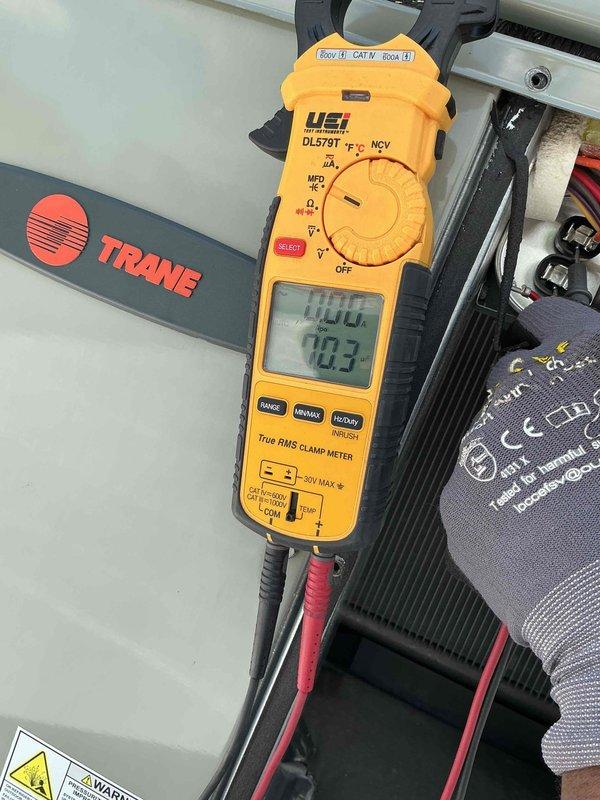 Completed preventive maintenance tune-up on Trane rooftop unit. Performed system diagnostics and electrical measurements using clamp meter, confirming proper operating parameters. Customer notified that 16x20x1 filter is not included with service and available for purchase; filter change date documented as 6/25/26.