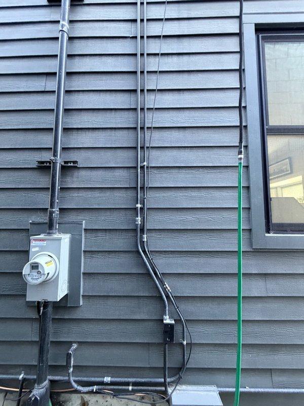 Disconnected and removed existing LG 12K BTU mini split system, including indoor power head and outdoor heat pump unit, and hauled away as junk. Installed new Lennox MWMD012S6-1P 12K BTU indoor power head in existing location and relocated Lennox MWLD012S6S-1P outdoor heat pump to side of building per specifications. Ran new lineset, power lines, low voltage wiring, and installed line-hide to connect indoor and outdoor units, completing full system installation and startup.