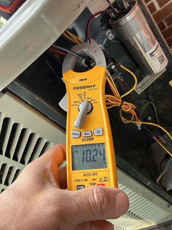 Completed preventative maintenance clean and check on air conditioning system per service comfort plan. Inspected and tested control board 4893D with all wire connections secure and functioning properly. Verified system operation with electrical testing, confirming proper voltage readings at 102.4V and capacitor performance within specifications.