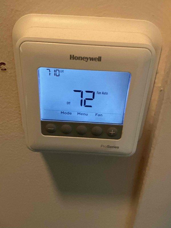 Completed spring preventative maintenance clean and check on outdoor air conditioning unit per Comfort Plan agreement. Performed comprehensive system inspection including electrical components, control board functionality, and refrigerant circuit evaluation. Verified proper operation of compressor, condenser fan motor, and all safety controls. Inspected circuit board with digital LED diagnostics display, confirmed all electronic components including capacitors, inductors, and relays in good working condition. Checked all wire connections and terminal blocks for tightness and proper voltage. Verified indoor thermostat operation showing system maintaining 72°F setpoint with fan set to auto mode. System operating within normal parameters with no deficiencies noted at time of service.