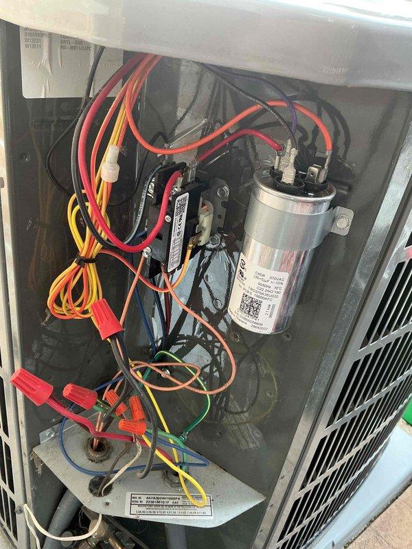 Completed annual air conditioning clean and check per service comfort plan. Performed comprehensive system inspection including electrical components, capacitor testing, and temperature differential measurements. All electrical connections were verified secure, capacitor tested within specifications at proper microfarad rating, and supply air temperature confirmed at 32.98°F indicating adequate cooling performance. System operating normally with no deficiencies noted.