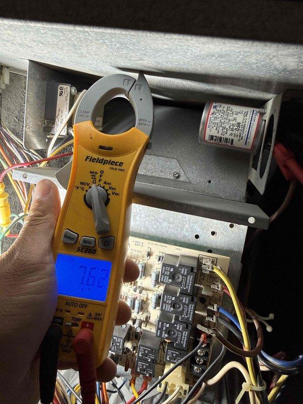 Completed comprehensive tune-up on single HVAC system, performing electrical diagnostics with clamp meter to verify proper amperage draw and component operation. Inspected control board, relays, capacitor, and all electrical connections; confirmed air filter condition and overall system functionality with all components operating within normal parameters.