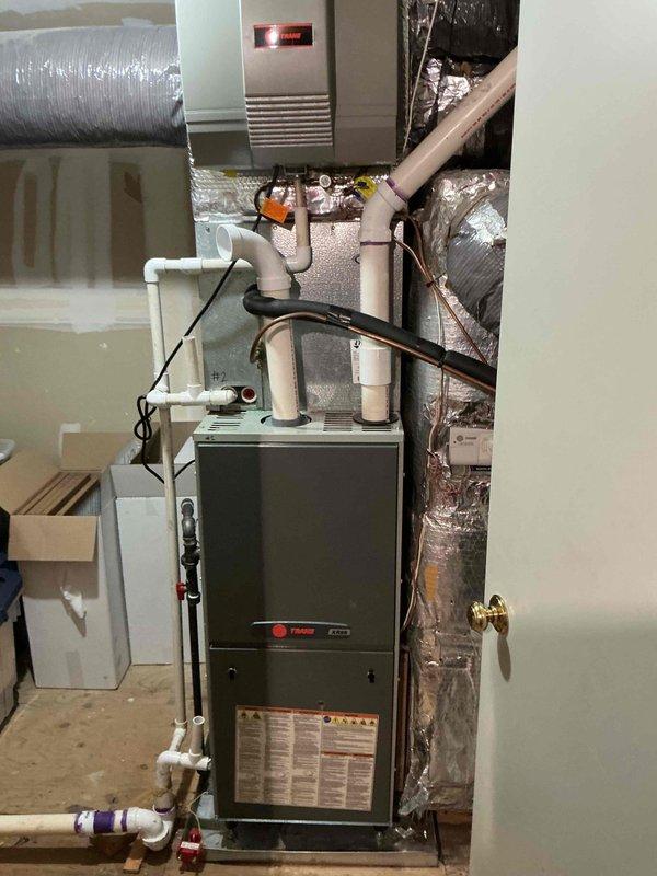 Completed comprehensive clean and check maintenance service on two HVAC systems per comfort plan agreement. Performed thorough inspection and maintenance on dual Trane outdoor condensing units and indoor air handler/furnace system, including coil cleaning, refrigerant level verification, electrical connection testing, and airflow assessment. All equipment operational and functioning within manufacturer specifications upon completion.
