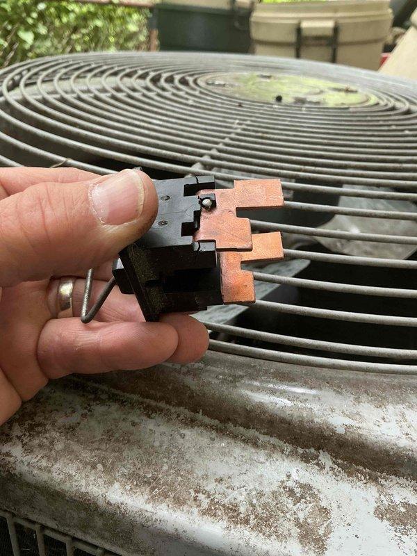 Responded to callback for AC system with no power and no cooling. Upon arrival, diagnosed failed contactor in outdoor condensing unit preventing compressor operation. Removed defective contactor with burned contacts and replaced with new unit, restored power to system, and verified proper operation with cooling restored throughout home.