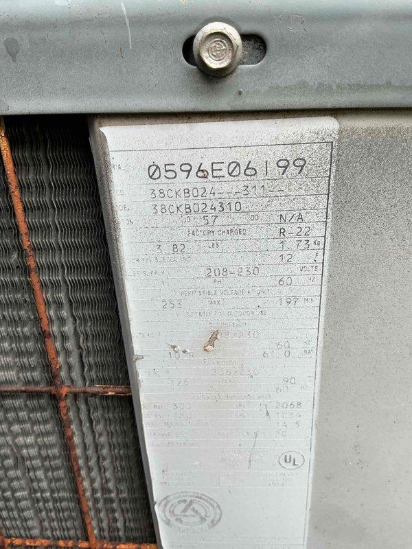 Completed spring preventive maintenance clean and check on two-system comfort plan covering a residential split system air conditioning unit, model 38CKB024310. Performed comprehensive inspection of outdoor condenser unit including visual assessment of cabinet condition, refrigerant line insulation, electrical connections, and manufacturer data plate verification. Documented equipment specifications and overall system condition through photographic records, noting unit positioned on proper concrete pad with adequate drainage and clearance between structures. Both systems inspected per manufacturer guidelines with all components found operational and ready for cooling season.
