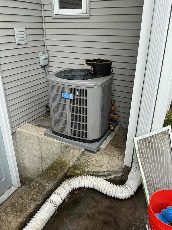 Completed spring preventive maintenance clean and check on two-system comfort plan covering a residential split system air conditioning unit, model 38CKB024310. Performed comprehensive inspection of outdoor condenser unit including visual assessment of cabinet condition, refrigerant line insulation, electrical connections, and manufacturer data plate verification. Documented equipment specifications and overall system condition through photographic records, noting unit positioned on proper concrete pad with adequate drainage and clearance between structures. Both systems inspected per manufacturer guidelines with all components found operational and ready for cooling season.