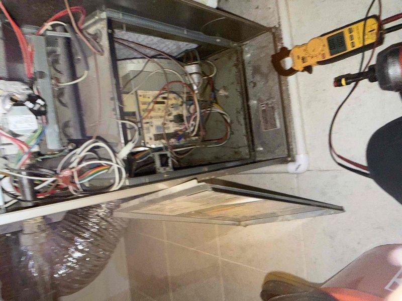 Responded to service call for non-operational air conditioning system affecting entire home. Upon arrival, performed comprehensive diagnostic evaluation of 15-year-old AC system using digital testing equipment to measure electrical parameters and system performance. Accessed internal components of air handler unit, inspected control boards, electrical connections, and wiring harnesses for proper operation. Conducted ductwork inspection and temperature measurements to assess airflow distribution throughout the system. Identified and resolved the operational issue, restoring full cooling functionality to the residence.