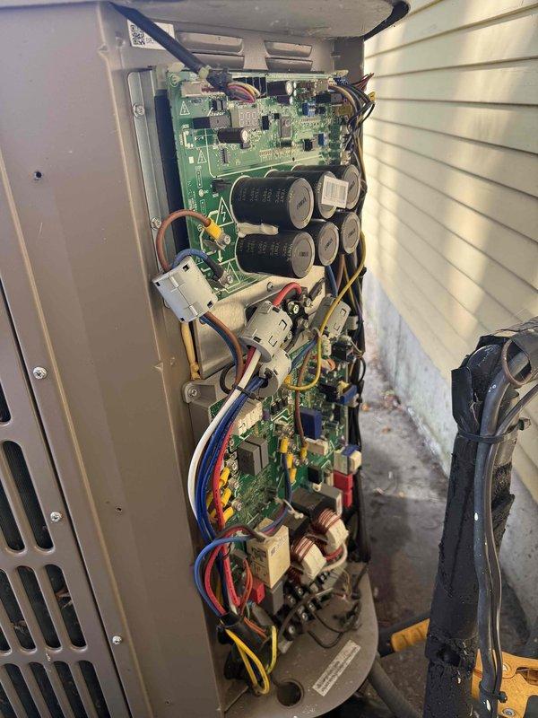 Performed comprehensive clean and check maintenance on air conditioning system per comfort plan agreement. Inspected and serviced outdoor condensing unit, accessing electrical compartment to verify proper operation of all components including dual capacitors, control boards, transformers, and relay systems. All electrical connections were inspected and found secure with proper wire management throughout. Checked and replaced air filter with clean 20x25x1 pleated media filter to ensure optimal airflow and system efficiency. System operational and ready for continued service.