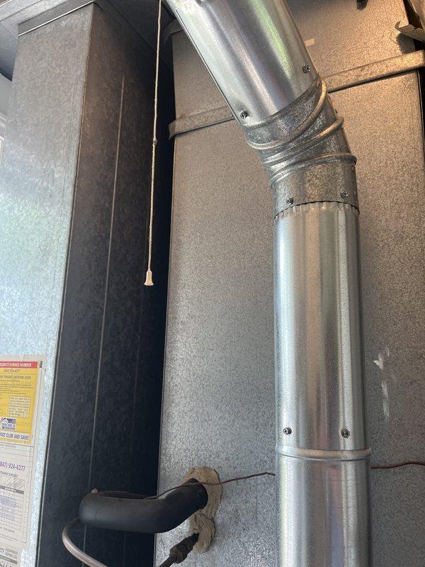 Conducted comprehensive assessment of existing residential HVAC system for replacement estimate. Customer requested evaluation due to advanced age of current equipment. Documented existing air handler unit, furnace, and associated ductwork configuration including vertical metallic duct runs, condensate drainage system with PVC piping, and gas line connections. Photographed complete system layout to support replacement recommendations and equipment sizing requirements.