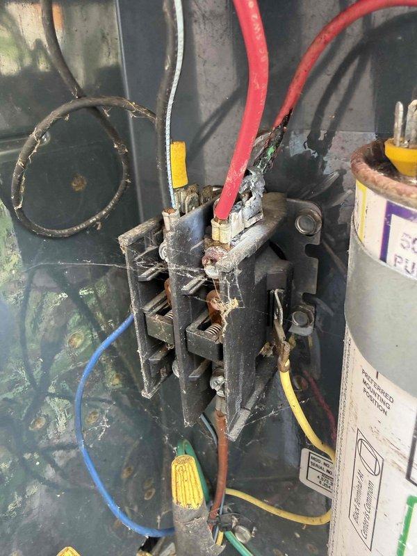 Responded to service call for air conditioning system blowing warm air with unit struggling to start. Upon inspection, discovered severely corroded contactor assembly with extensive rust and oxidation affecting electrical connections and metal components. The deterioration was significant enough to prevent proper contactor operation, resulting in compressor failure to engage and loss of cooling capacity. Replaced failed contactor assembly and verified all electrical connections were secure. Tested system operation through complete cooling cycle, confirmed proper compressor startup, and verified adequate airflow and temperature differential across evaporator coil. System restored to normal cooling operation.