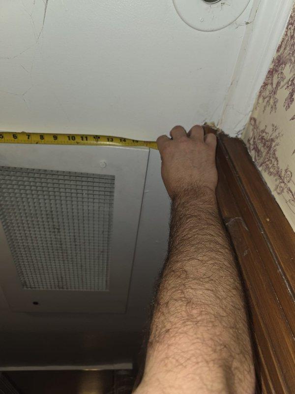 Completed on-site estimate for second floor Unico high-velocity air handler replacement. Performed detailed measurements of existing return air vent locations and clearances at ceiling level to assess system configuration and spatial requirements for new equipment installation. Documented existing HVAC infrastructure with photographic evidence to support replacement specifications and ensure proper sizing of new high-velocity system components.